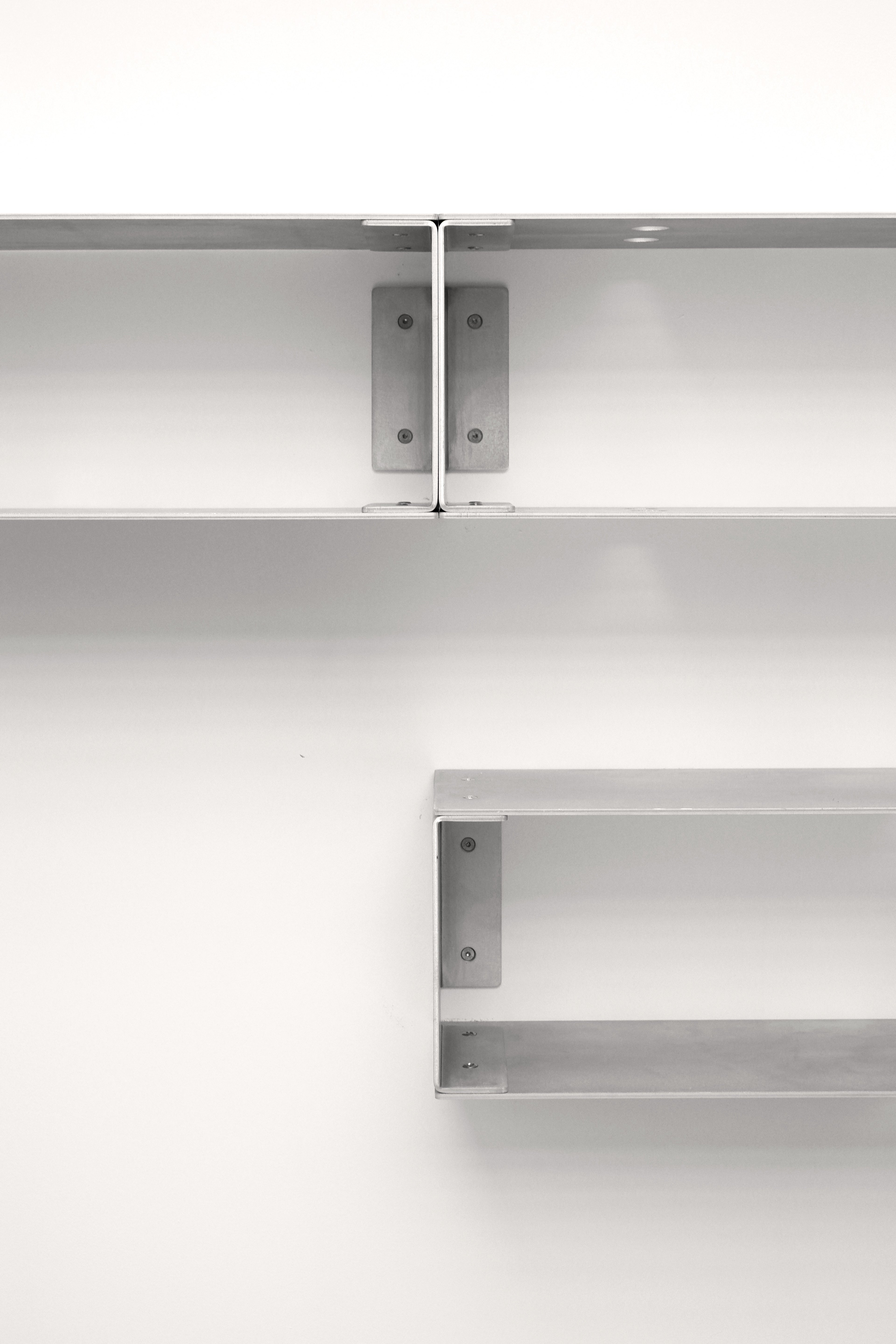 Metal shelves on a white background
