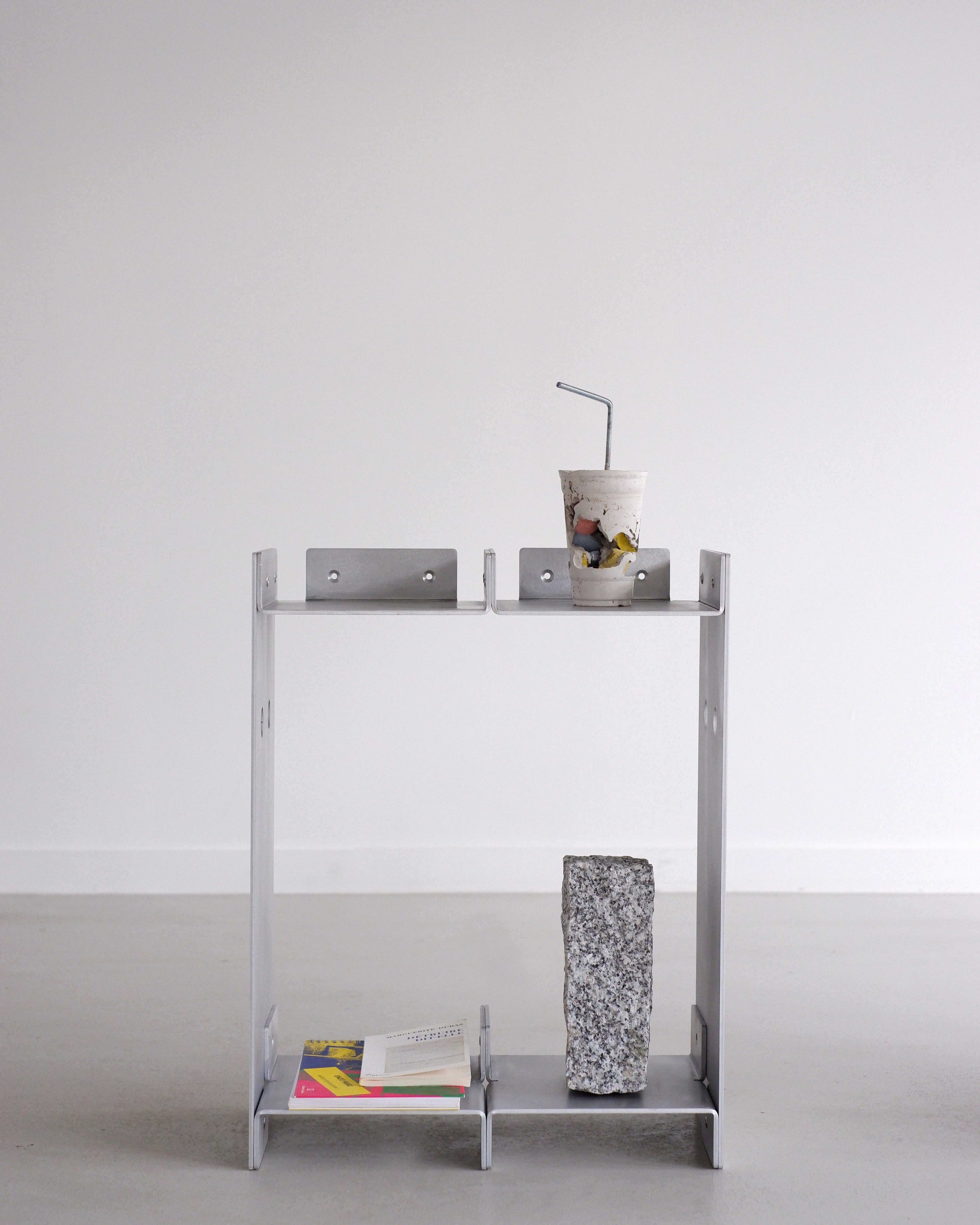 Metal shelving unit with a white background